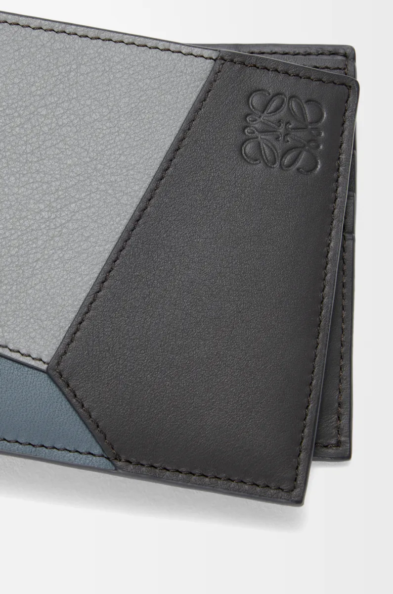 经典牛皮革 Puzzle 双折钱包