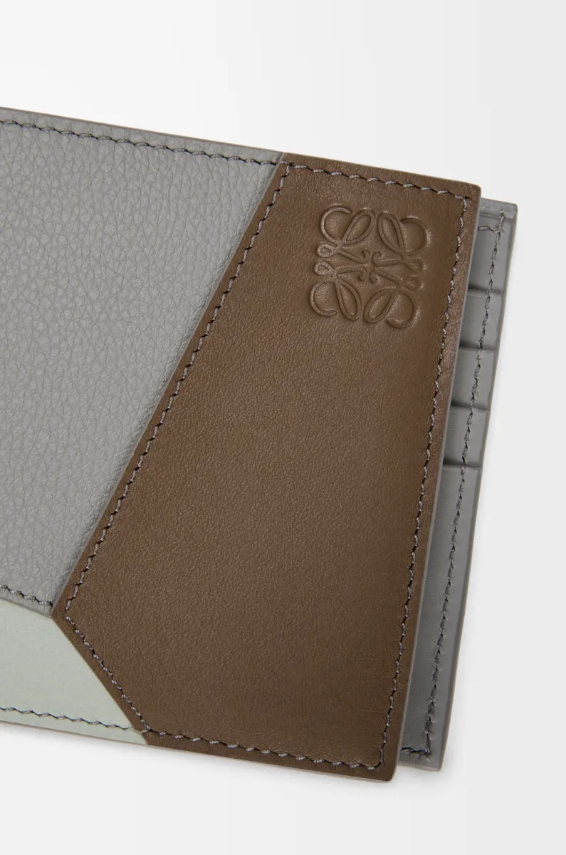 经典牛皮革 Puzzle 双折钱包