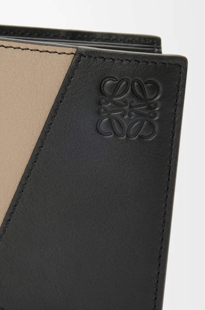 经典牛皮革 Puzzle 双折钱包