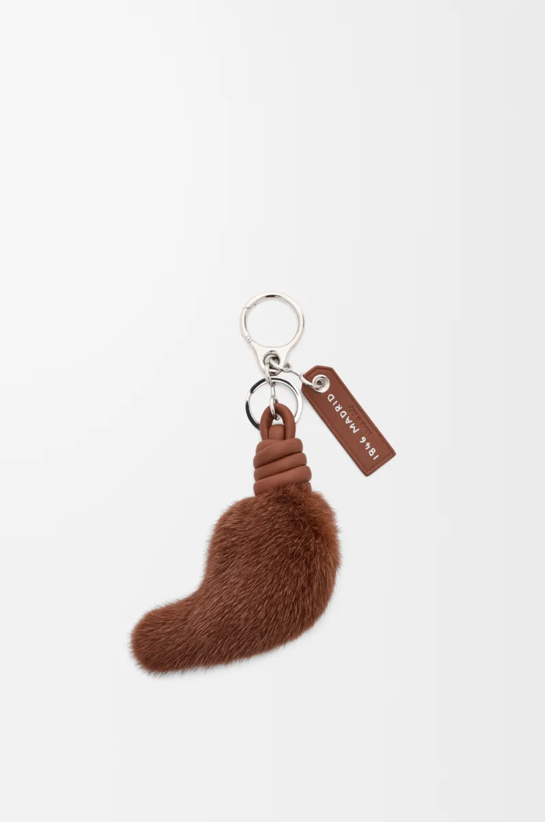 Lion tail charm in shearling and calfskin