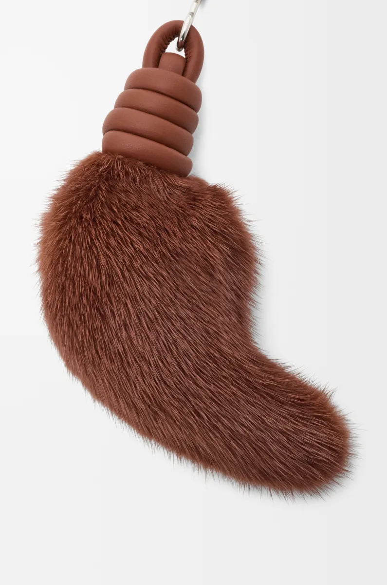 Lion tail charm in shearling and calfskin