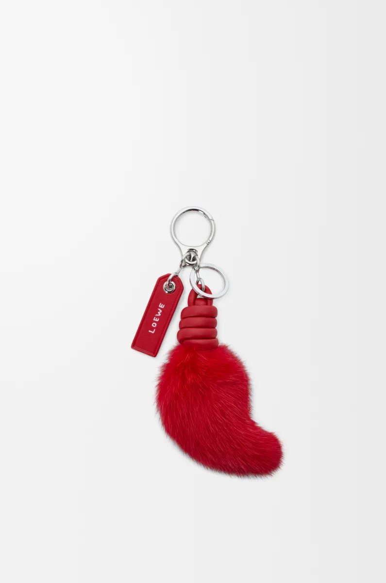 Lion tail charm in shearling and calfskin