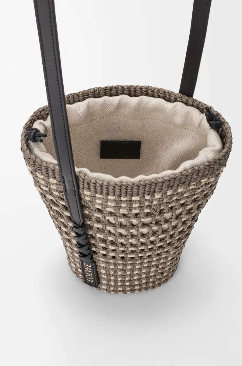 Braid pocket in iraca palm and calfskin