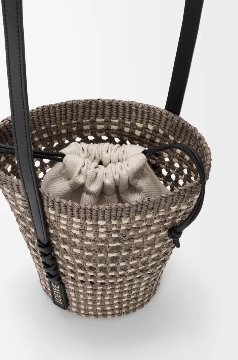 Braid pocket in iraca palm and calfskin