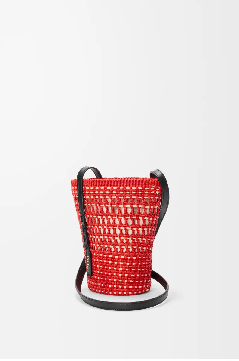 Braid pocket in iraca palm and calfskin