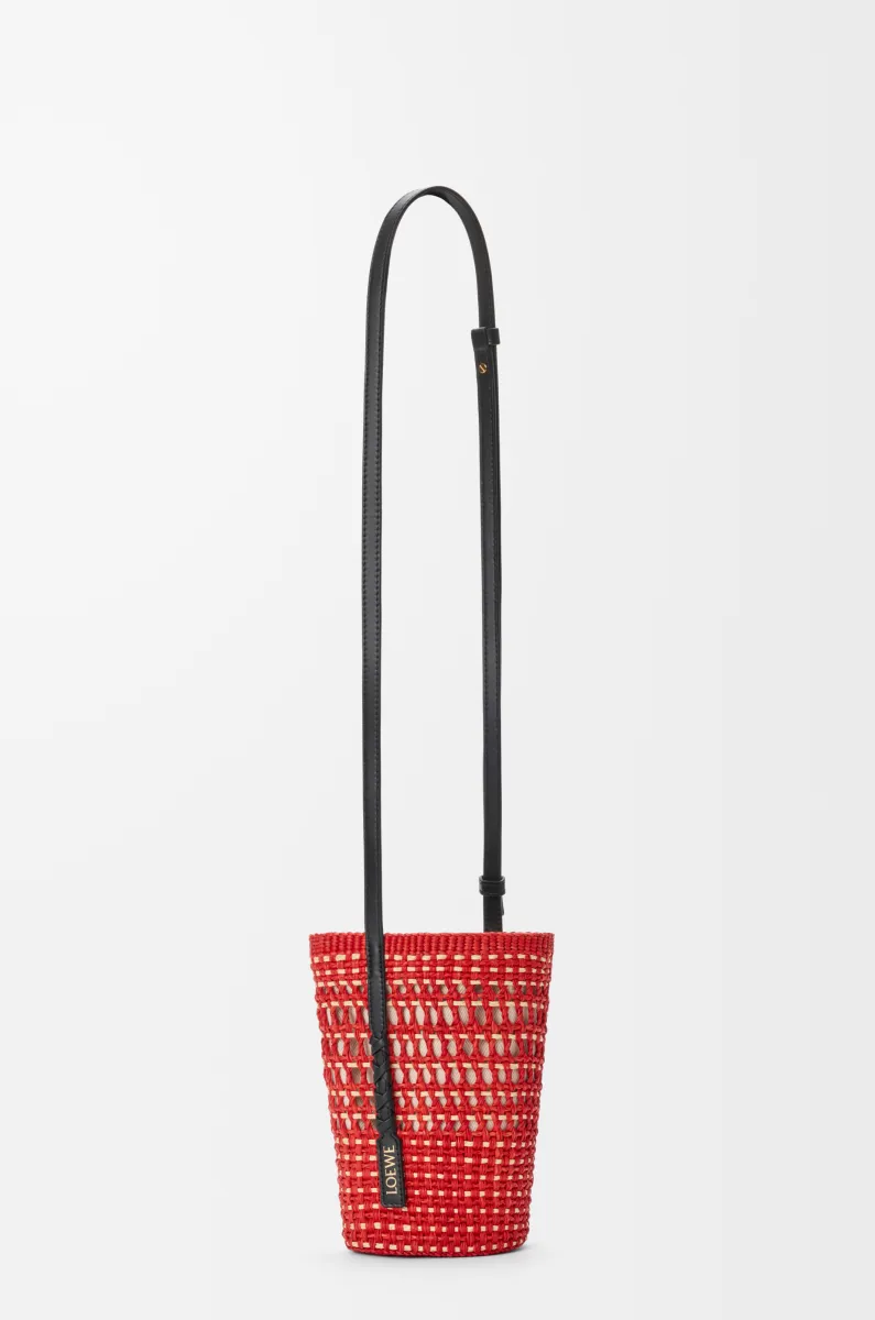 Braid pocket in iraca palm and calfskin