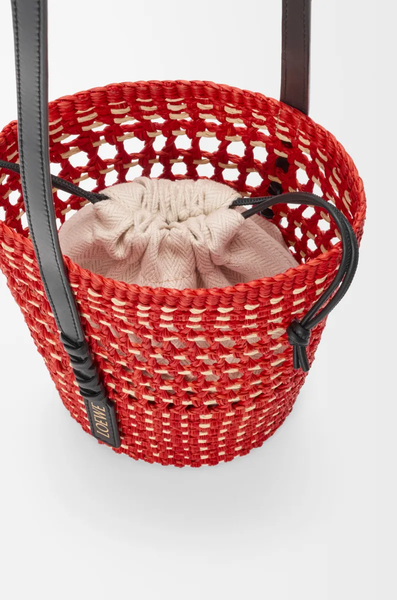 Braid pocket in iraca palm and calfskin