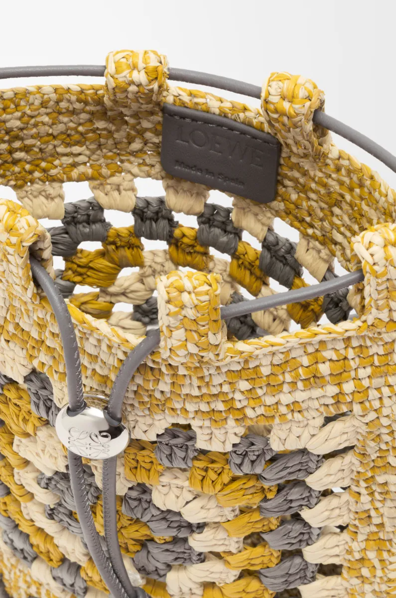 经典牛皮革和拉菲草抽绳小袋