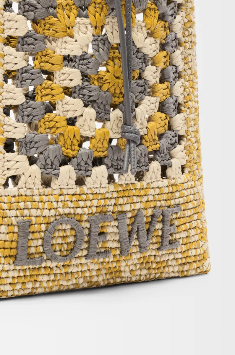 经典牛皮革和拉菲草抽绳小袋