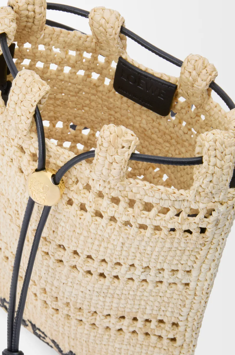 拉菲草抽绳手拿包