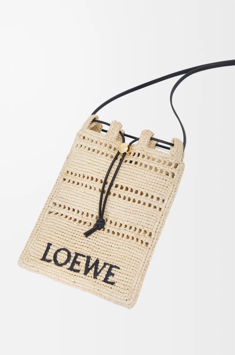 拉菲草抽绳手拿包