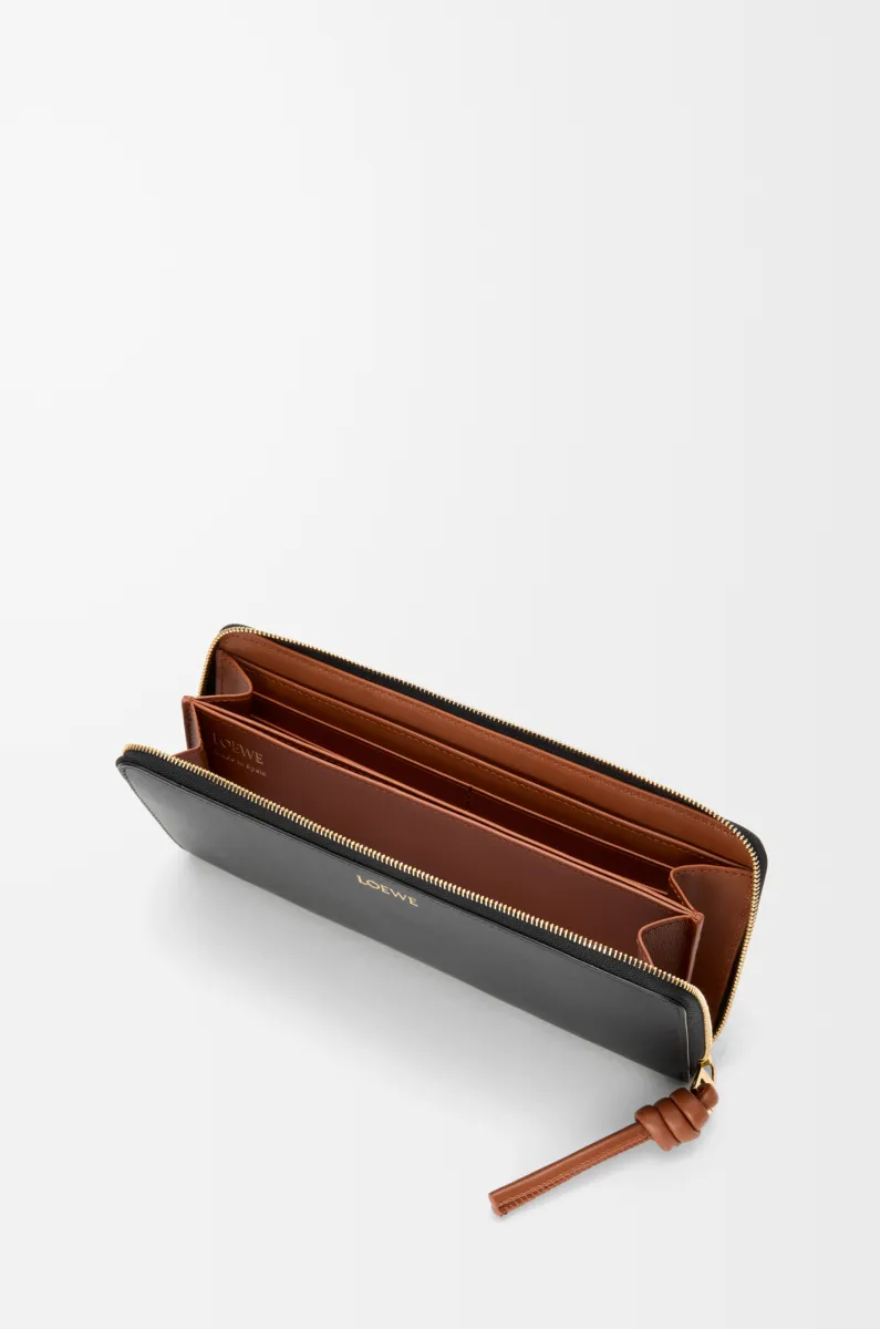 亮面纳帕牛皮革绳结环绕式拉链钱包