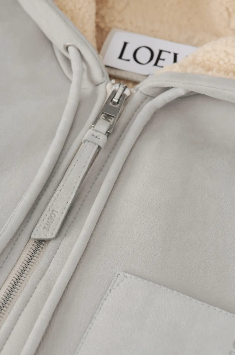 剪羊毛连帽背心