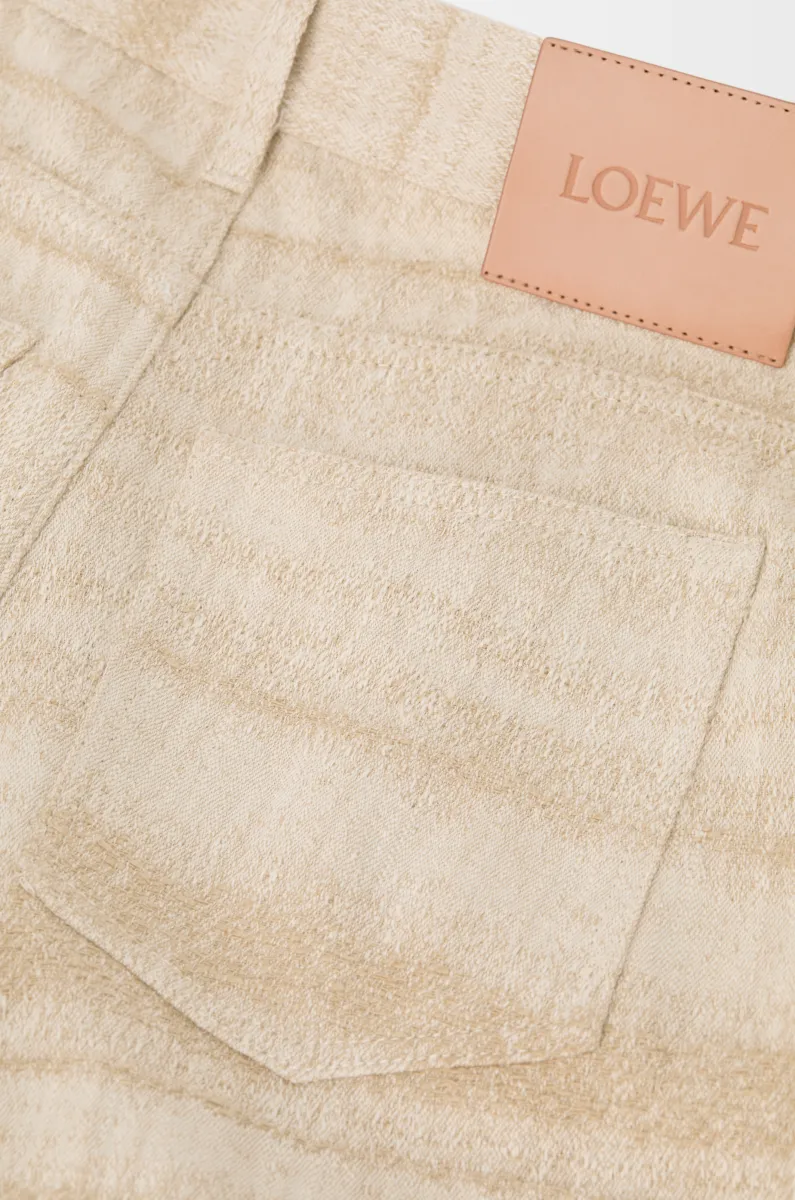 单宁布锥形牛仔裤